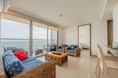 a living room with a couch and a table at 2102 Morros City - Espectacular Vista al Mar in Cartagena de Indias