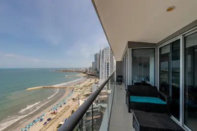 a balcony with a view of the beach and buildings at 2102 Morros City - Espectacular Vista al Mar in Cartagena de Indias