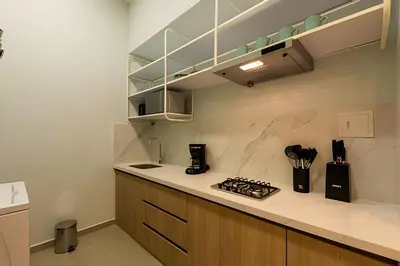 a kitchen with a counter and a stove top oven at Espectacular apto en Centro Histórico - Zaher F in Cartagena de Indias