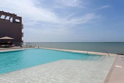 a large swimming pool on top of a building at Lujoso Apto de 2 Hab en piso 26 - Morros City in Cartagena de Indias
