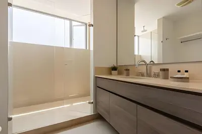 a bathroom with a shower and a sink and a tub at 3605 Morros City - Paraiso en Cartagena in Cartagena de Indias