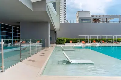 a swimming pool on the side of a building at 3605 Morros City - Paraiso en Cartagena in Cartagena de Indias