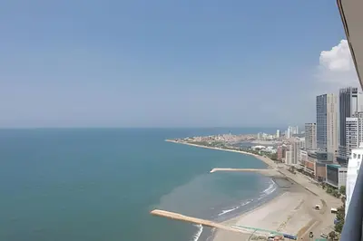 a view of a beach with buildings and the ocean at 3605 Morros City - Paraiso en Cartagena in Cartagena de Indias