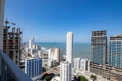 a view of a city skyline with the ocean at Infinitum Espectacular apto piso 28 vista al mar in Cartagena de Indias