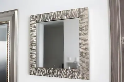 a mirror with a silver frame on a wall at Lujoso Apto de 1 habitacion en piso 29-Morros City in Cartagena de Indias
