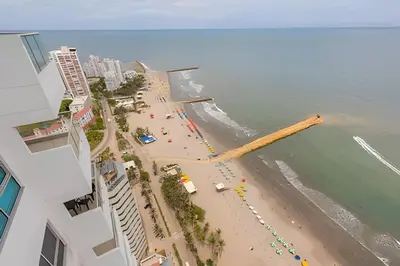 an aerial view of a beach with a large wooden pole at Lujoso Apto de 3 Habitaciones-3303 Palmetto Beach in Cartagena de Indias
