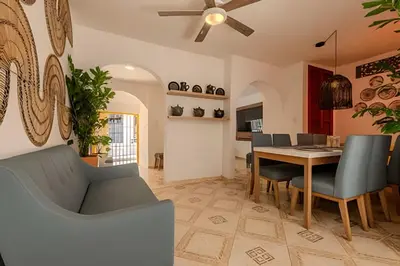 a dining room with a table and chairs at Casa Hibiscus - Joya en Getsemani in Cartagena de Indias