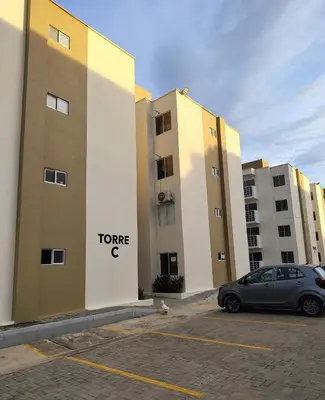 a car parked in a parking lot in front of some buildings at Apartamento exclusivo para unas vacaciones confortables in Coveñas