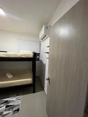 a door to a room with a bunk bed at Rent by days, 4th floor apartment in Cartagena de Indias