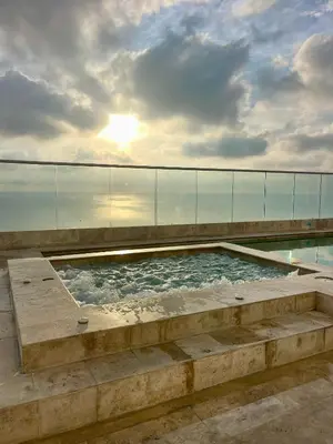 a swimming pool on the roof of a building at Apartamento en Cartagena cerca al Hotel Hilton in Cartagena de Indias