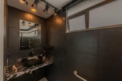 a bathroom with a sink and a mirror at Espectacular vista al mar - Infinito 2502 in Cartagena de Indias