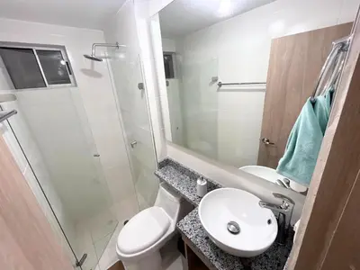 a bathroom with a sink and a toilet and a shower at Team Renacer Broker Brisas del Mar and Pool in Cartagena de Indias