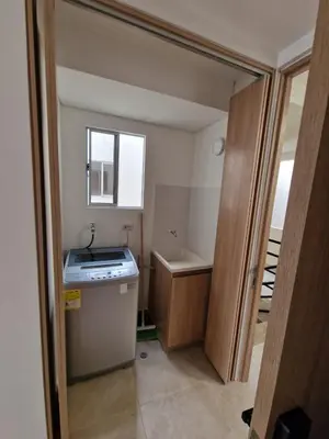 a small bathroom with a sink and a tub at Apartamento en Cartagena, Manzanillo in La Siriaca
