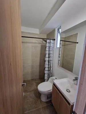 a bathroom with a toilet and a sink at Apartamento en Cartagena, Manzanillo in La Siriaca