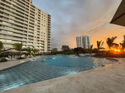 a large swimming pool in front of some buildings at Santa Marta apartamento con vista al mar- santamarina-709 in Santa Marta