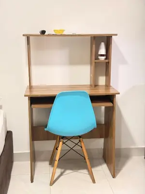 a blue chair sitting in front of a desk at Calidad vs precio, wifi, cerca centro historico 3-2 in Cartagena de Indias