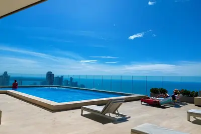a swimming pool on the roof of a building at by Calamari Homes - Murano Elite 1901 Bocagrande in Cartagena de Indias