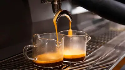 a person is pouring coffee into a cup at Four Seasons Hotel & Residences Cartagena in Cartagena de Indias