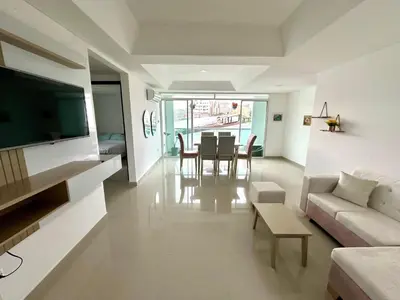 a living room with a couch and a table at Dubai 202 in Barranquilla