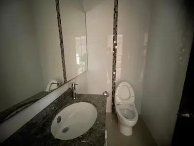 a bathroom with a sink and a toilet at Bijao 6b in Barranquilla
