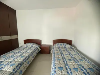 two beds sitting next to each other in a bedroom at Bijao 6b in Barranquilla