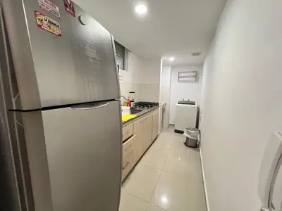 a kitchen with a stainless steel refrigerator at Kairos 1209 in Barranquilla