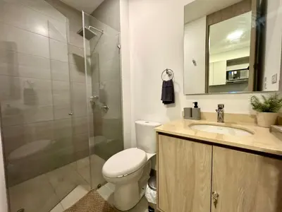 a bathroom with a toilet and a sink and a shower at Apartamento con vistas al mar-SantaMarina-1303 in Santa Marta