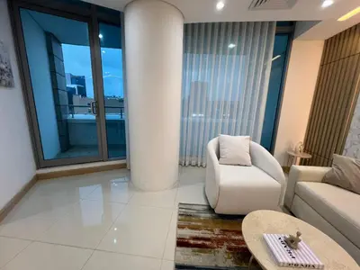 a living room with a couch and a table at Blue Gardens in Barranquilla