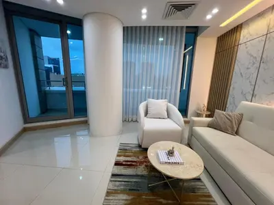 a living room with a couch and a table at Blue Gardens in Barranquilla