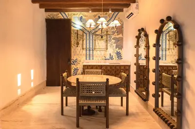a dining room with a table and chairs at Hotel Palacio del Agua by Faranda Boutique in Cartagena de Indias
