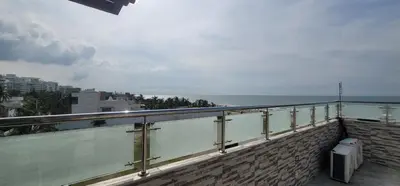 a balcony with a view of the ocean at Live Stay - Boquilla SunSet in Cartagena de Indias