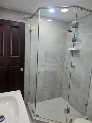 a glass shower in a bathroom with a sink at Apartment in El Cabrero in Cartagena de Indias