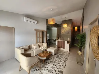 a living room with a couch and a table at Hotel Casa Obed in Cartagena de Indias