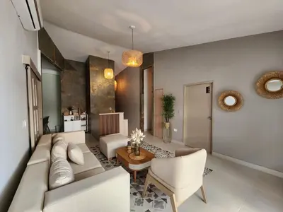 a living room with a couch and a table at Hotel Casa Obed in Cartagena de Indias