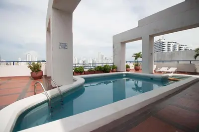 a swimming pool on the roof of a building at Tropical Beach - Con vista al mar in Cartagena de Indias