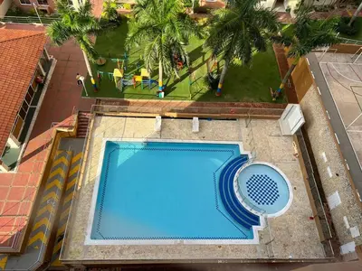 an overhead view of a swimming pool in a building at Apartamento 3 alcobas barrio Miramar Barranquilla in Barranquilla