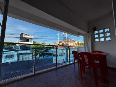 a room with a table and chairs and a large window at Mar azul Cartagena in Arizona