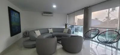 a living room with a couch and two chairs at Live Stay - Boquilla Le Solei in Cartagena de Indias