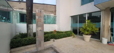 a building with plants in front of a building at Live Stay - Boquilla Le Solei in Cartagena de Indias