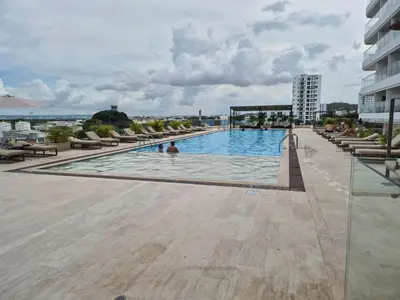 a swimming pool on the roof of a building at Olas & relax Cartagena in Cartagena de Indias