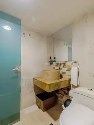a bathroom with a sink and a toilet at Luxury Duplex Retreat, Aldaba Selection in Cartagena de Indias
