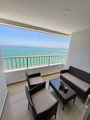 a living room with a view of the ocean at Apartment in Cartagena 5 minutes from the historic center in Cartagena de Indias