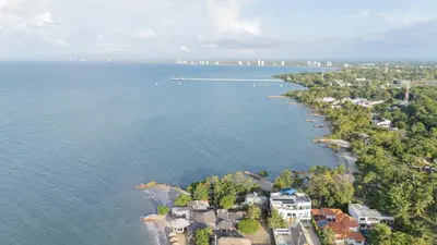 an aerial view of the shoreline of a lake at Cabaña Playa Azul in Coveñas
