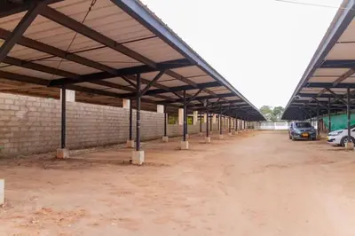 an empty parking lot with a large metal roof at Acogedor apto en Coveñas 401 in Coveñas