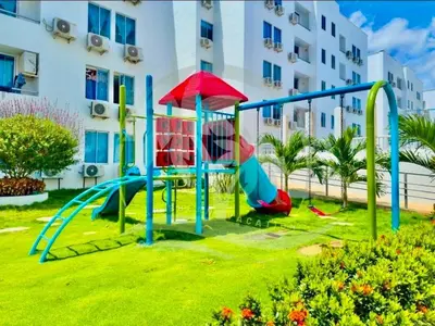 a playground in a park in front of a building at Acogedor apto en Coveñas 204 in Coveñas