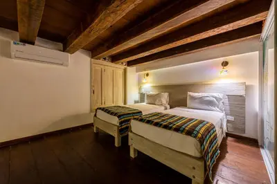 a bedroom with two beds in a room at Apartamento Virrey in Cartagena de Indias