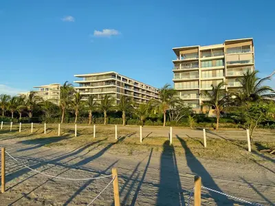 a volley ball court in front of a building at Shoreline Escape - Private Pool - Beach in Cartagena de Indias