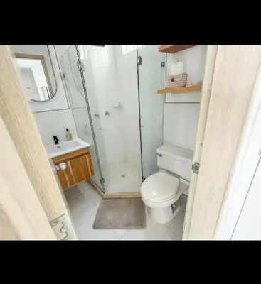 a small bathroom with a shower and a toilet at Modern and comfortable in Cartagena de Indias