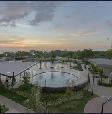 a view of a swimming pool in a resort at New luxury studio apartment with ocean view, Santa Marta in Simón Bolivar