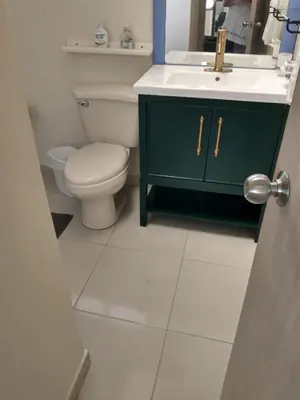 a bathroom with a sink and a toilet at Casa - EL LAGUITO in Cartagena de Indias
